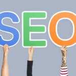 Que es el SEO local y cuales son sus beneficios  Que es el SEO local y cuales son sus beneficios hands holding up colorful letters forming the abbreviation seo 150x150